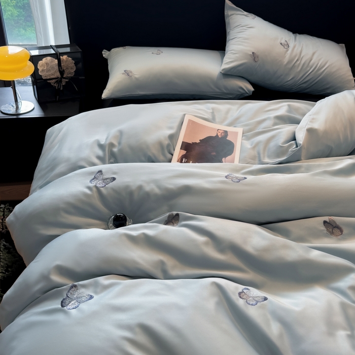 91家纺网 家纺一手货源 找家纺 红嘴企鹅2025新款幻影冰丝四件套-蝴蝶系列 幻影-兰色