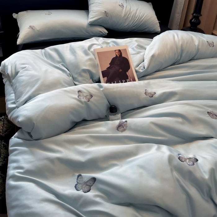 91家纺网 家纺一手货源 找家纺 红嘴企鹅2025新款幻影冰丝四件套-蝴蝶系列 幻影-兰色