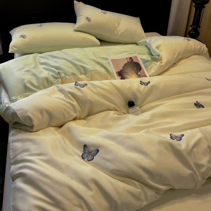 91家纺网 家纺一手货源 找家纺 红嘴企鹅2025新款幻影冰丝四件套-蝴蝶系列 幻影-奶昔白