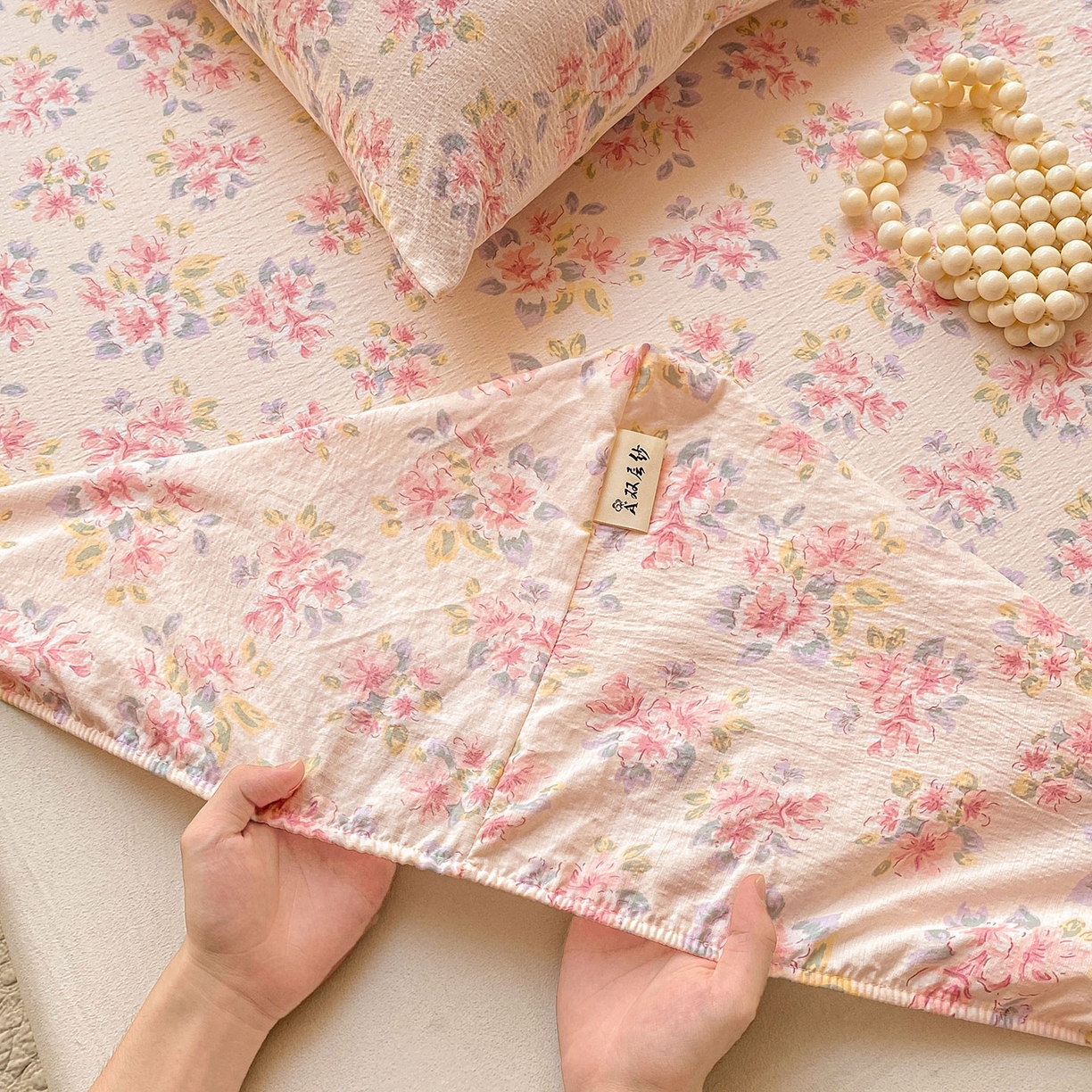 91家纺网 家纺一手货源 找家纺 眠势力 2025新款云感双层纱床笠三件套ins奶油风云感床垫保护套四季款 粉调花海