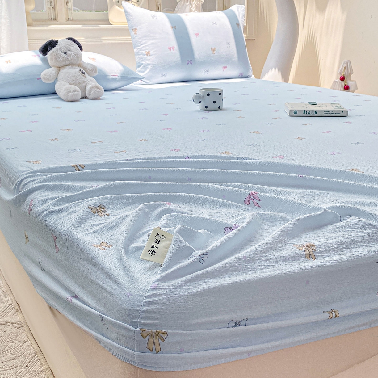 91家纺网 家纺一手货源 找家纺 眠势力 2025新款云感双层纱床笠三件套ins奶油风云感床垫保护套四季款 蓝调蝴蝶结