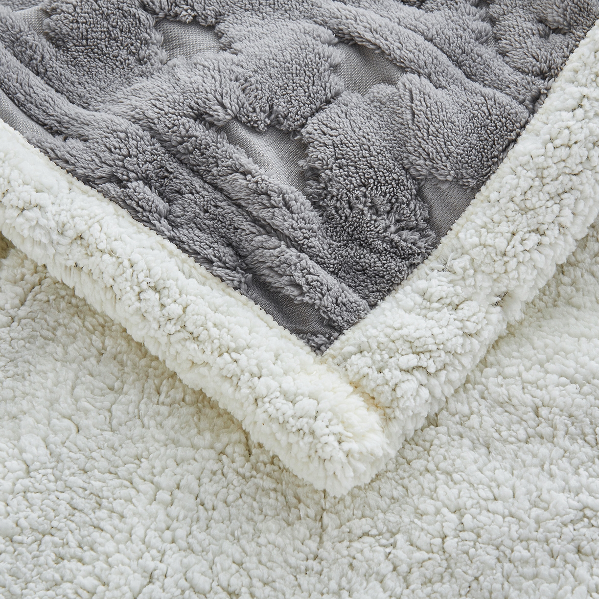 91家纺网 家纺一手货源 找家纺 枋梢家纺 2025新款提花舒棉绒镂空塔芙绒羊羔绒双层毛毯毯子跨境电商 韵律-浅灰