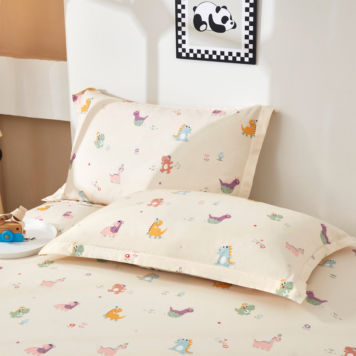 91家纺网 家纺一手货源 找家纺 乐居家纺 2025新款针织棉双层纱单件床笠 恐龙乐园