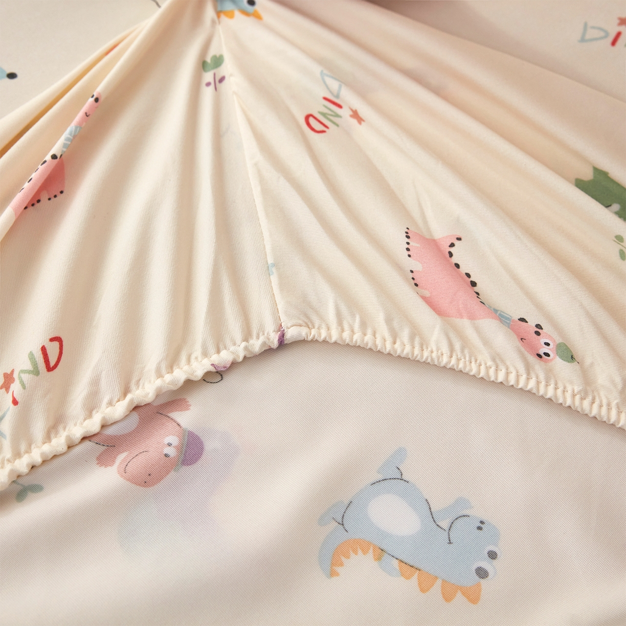 91家纺网 家纺一手货源 找家纺 乐居家纺 2025新款针织棉双层纱单件床笠 恐龙乐园