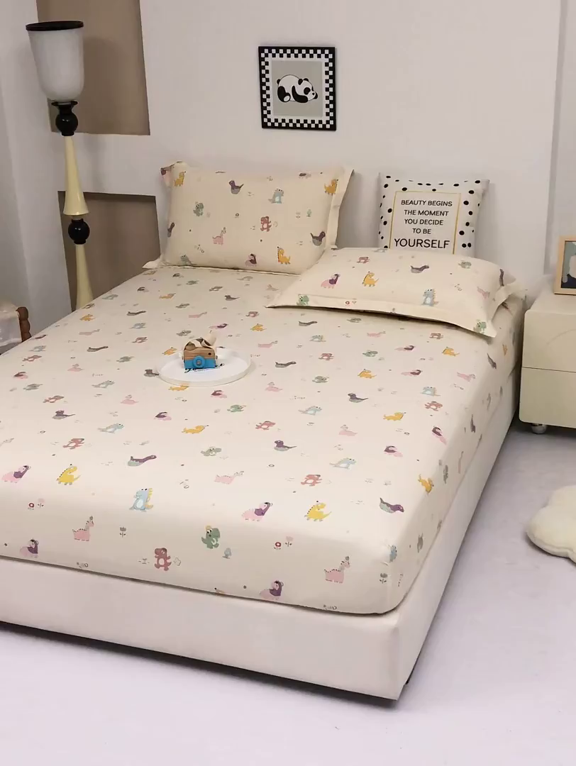 91家纺网 家纺一手货源 找家纺 乐居家纺 2025新款针织棉双层纱单件床笠 恐龙乐园