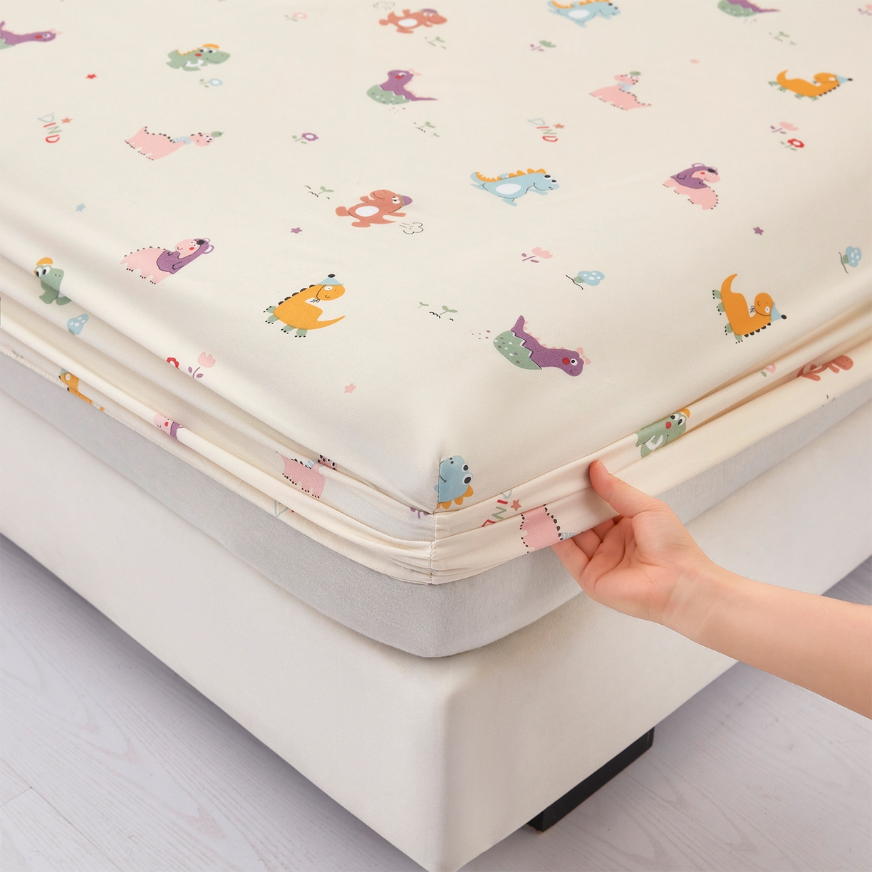 91家纺网 家纺一手货源 找家纺 乐居家纺 2025新款针织棉双层纱单件床笠 恐龙乐园