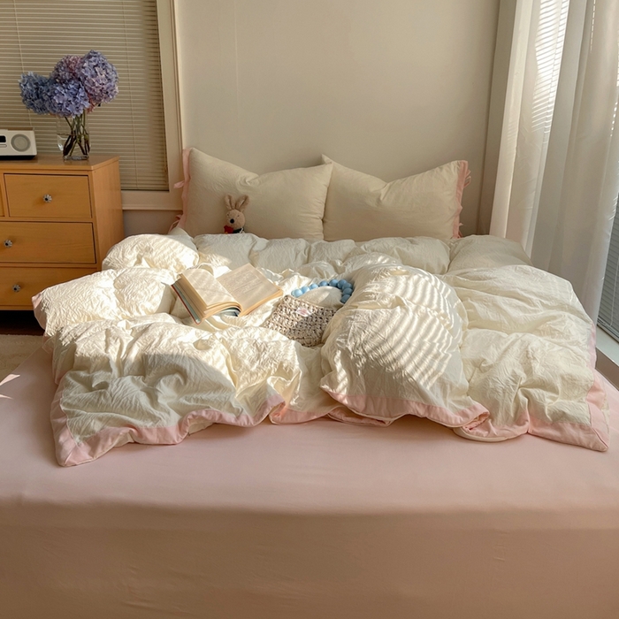 91家纺网 家纺一手货源 找家纺 轻奢坊 2025新款水洗棉纯色撞色包边绑带款四件套 芝士白