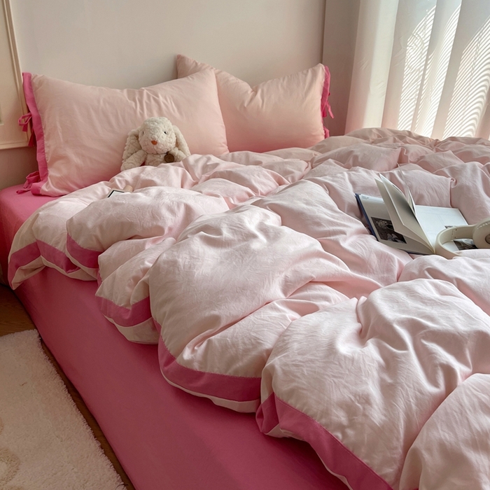 91家纺网 家纺一手货源 找家纺 轻奢坊 2025新款水洗棉纯色撞色包边绑带款四件套 蜜桃粉