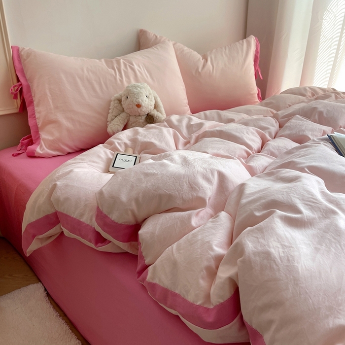 91家纺网 家纺一手货源 找家纺 轻奢坊 2025新款水洗棉纯色撞色包边绑带款四件套 蜜桃粉