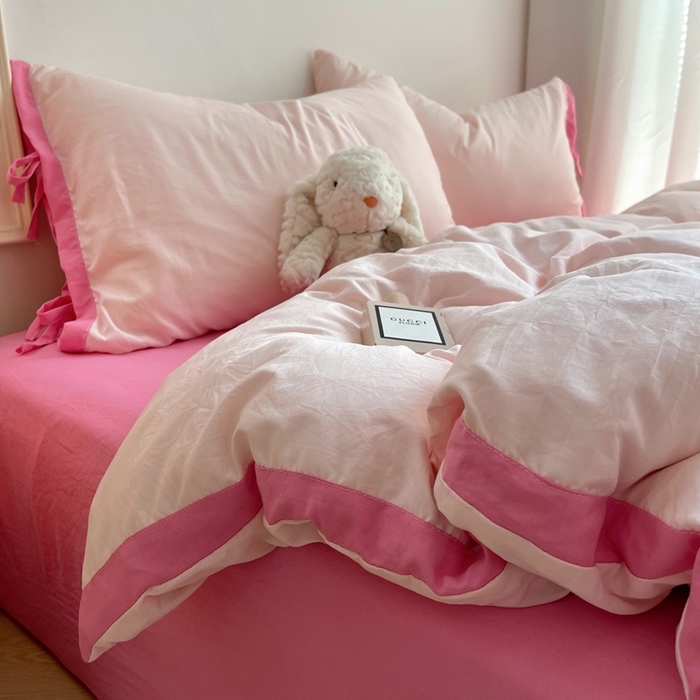 91家纺网 家纺一手货源 找家纺 轻奢坊 2025新款水洗棉纯色撞色包边绑带款四件套 蜜桃粉