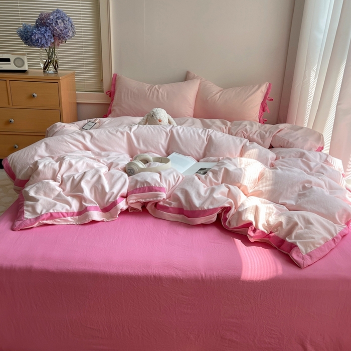 91家纺网 家纺一手货源 找家纺 轻奢坊 2025新款水洗棉纯色撞色包边绑带款四件套 蜜桃粉