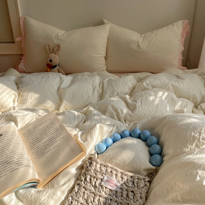 91家纺网 家纺一手货源 找家纺 轻奢坊 2025新款水洗棉纯色撞色包边绑带款四件套 芝士白