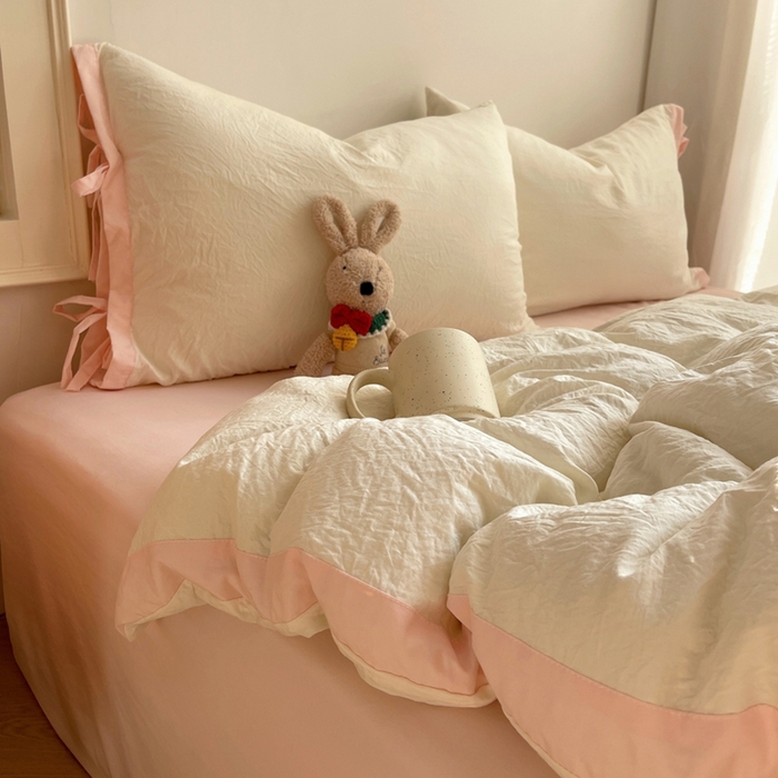 91家纺网 家纺一手货源 找家纺 轻奢坊 2025新款水洗棉纯色撞色包边绑带款四件套 芝士白