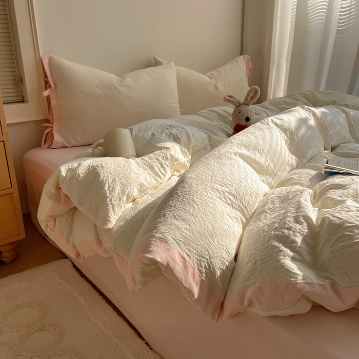 91家纺网 家纺一手货源 找家纺 轻奢坊 2025新款水洗棉纯色撞色包边绑带款四件套 芝士白