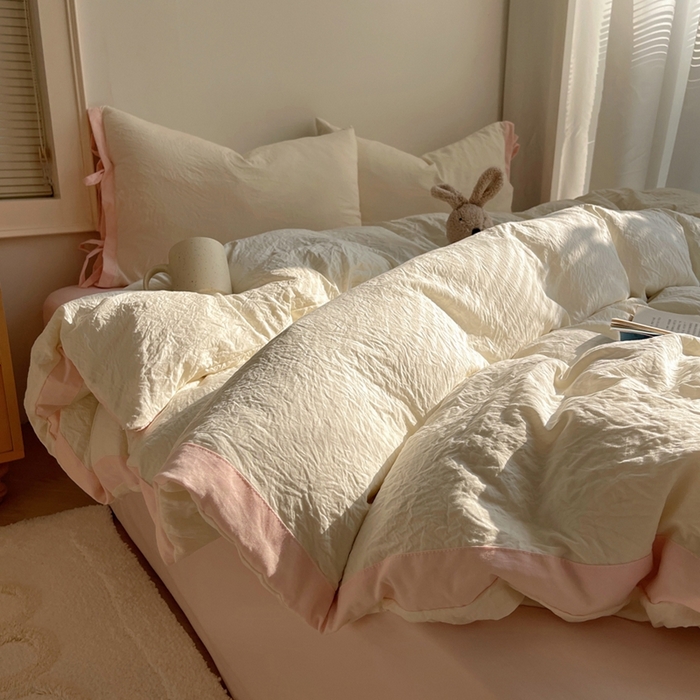 91家纺网 家纺一手货源 找家纺 轻奢坊 2025新款水洗棉纯色撞色包边绑带款四件套 芝士白