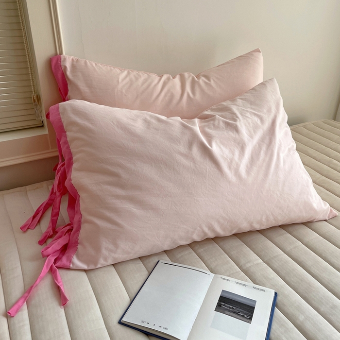 91家纺网 家纺一手货源 找家纺 轻奢坊 2025新款水洗棉纯色撞色包边绑带款单品枕套枕套单件 单枕桃蜜桃粉