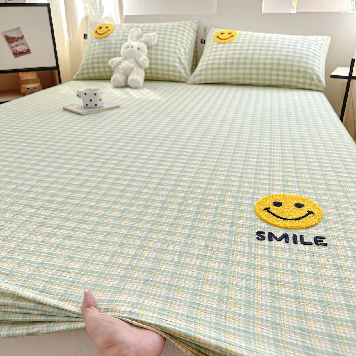 91家纺网 家纺一手货源 找家纺 乐美家纺 2025秋冬新款全棉色织水洗棉床笠三件套系列 微笑