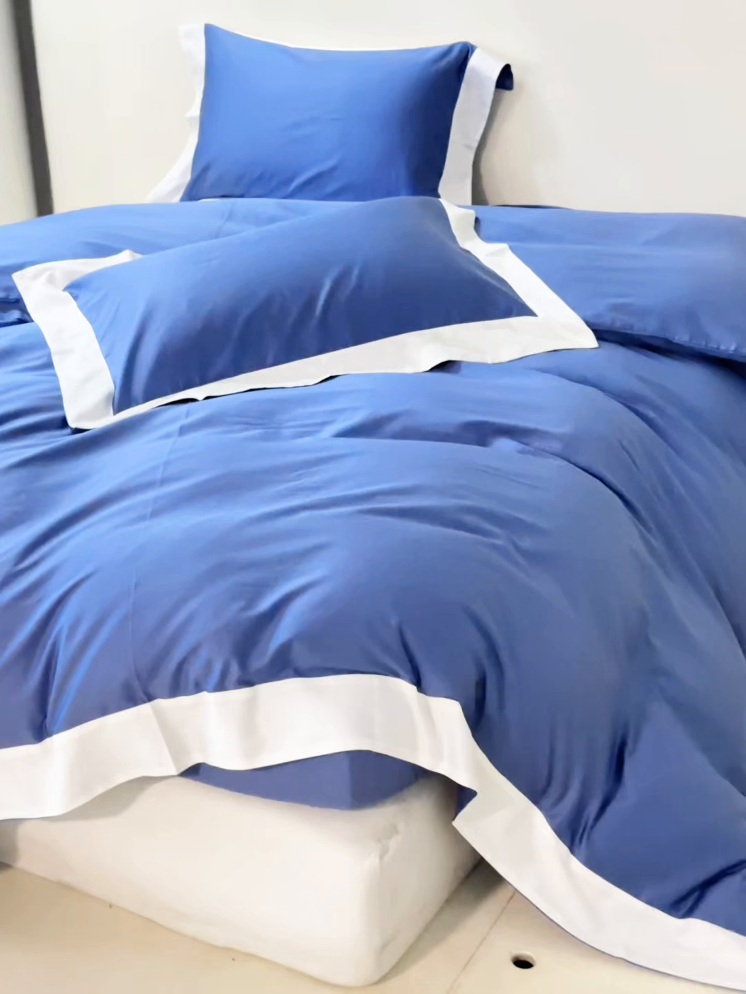 91家纺网 家纺一手货源 找家纺 晶缦家纺 2025新款纯棉全棉50支双股贡缎长绒棉拼边四件套 流光绮境-霁蓝