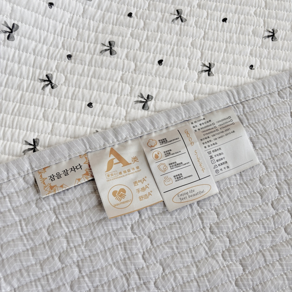 91家纺网 家纺一手货源 找家纺 金艾草 2025新款双面纯棉高温水洗床盖三件套 领结-米