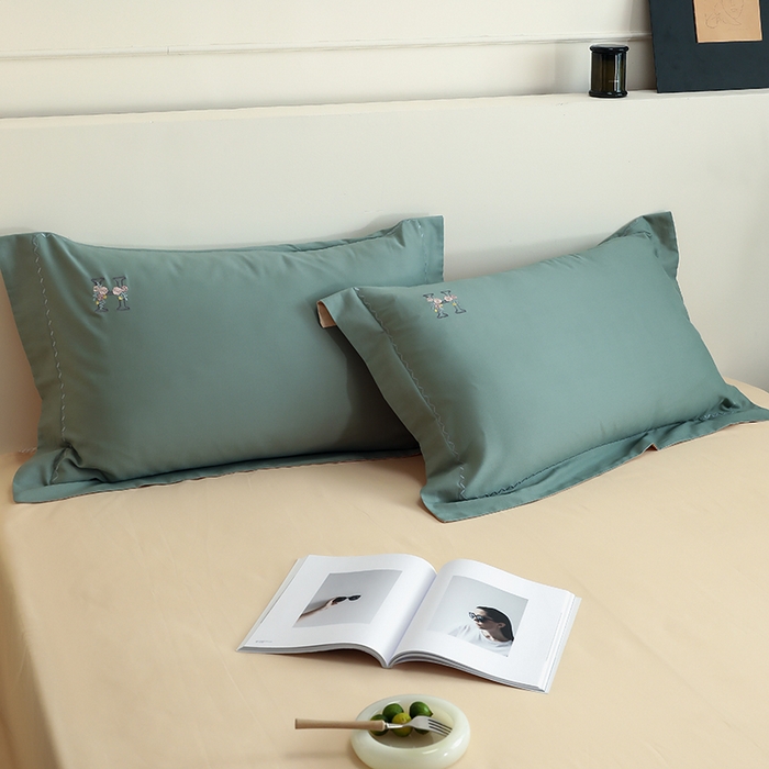 91家纺网 家纺一手货源 找家纺 禾时2025新款精梳火山全棉小磨毛工艺单品枕套 松风绿丨闪耀黄