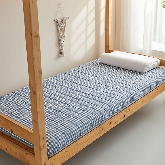 91家纺网 家纺一手货源 找家纺 暖季2025新款A类无印风学生款 棉花床垫 蓝小格