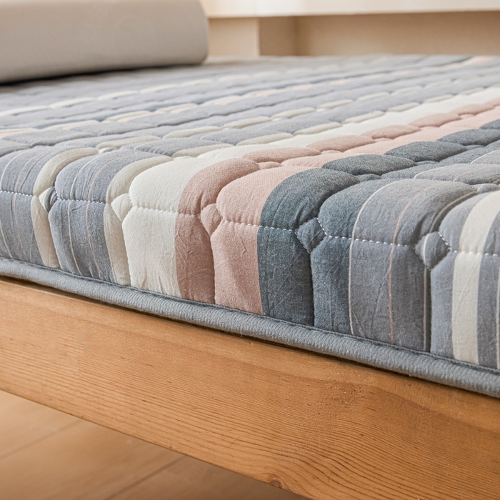 91家纺网 家纺一手货源 找家纺 暖季2025新款A类无印风学生款 棉花床垫马里奥灰