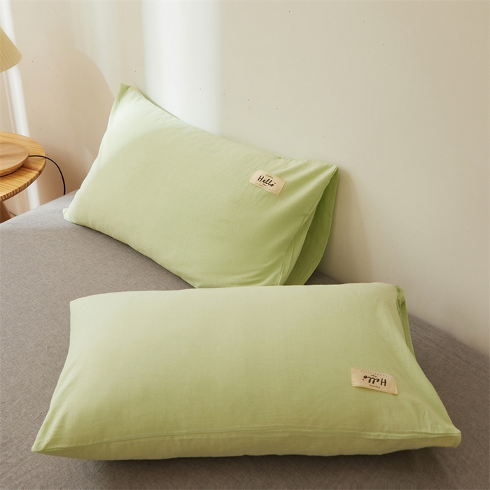 91家纺网 家纺一手货源 找家纺 恋人优选2025新款纯棉色织水洗贴标枕套 果绿