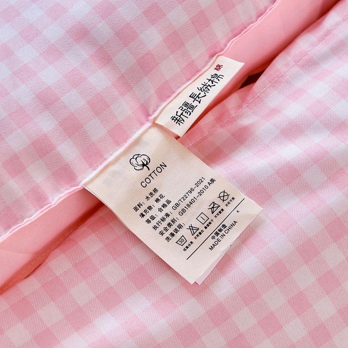 91家纺网 家纺一手货源 找家纺  默忆2025新款水洗棉新疆棉花立体抗菌床垫【抽绳袋包装】 粉小格