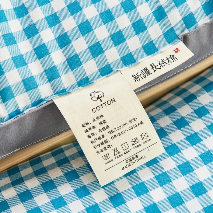 91家纺网 家纺一手货源 找家纺  默忆2025新款水洗棉新疆棉花立体抗菌床垫【抽绳袋包装】 蓝小格