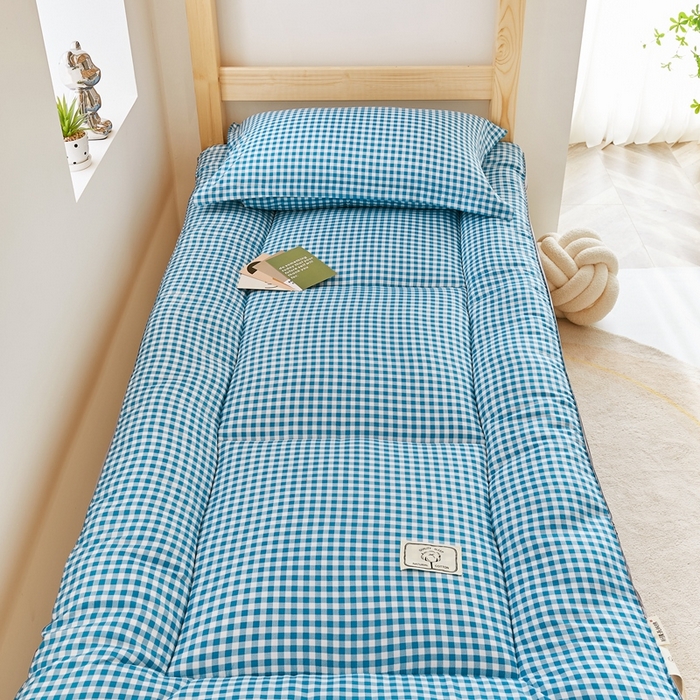 91家纺网 家纺一手货源 找家纺  默忆2025新款水洗棉新疆棉花立体抗菌床垫【抽绳袋包装】 蓝小格