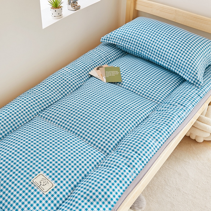 91家纺网 家纺一手货源 找家纺  默忆2025新款水洗棉新疆棉花立体抗菌床垫【抽绳袋包装】 蓝小格