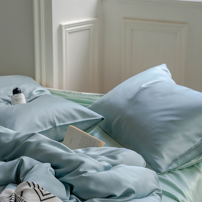 91家纺网 家纺一手货源 找家纺 威克凯丽 2025新款60支纯色兰精天丝四件套--风格一 天空蓝-浅艾绿