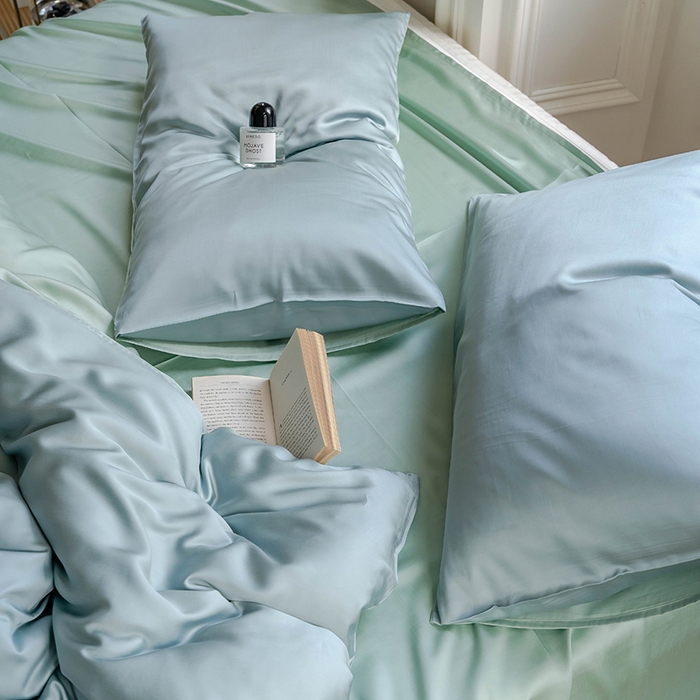 91家纺网 家纺一手货源 找家纺 威克凯丽 2025新款60支纯色兰精天丝四件套--风格一 天空蓝-浅艾绿