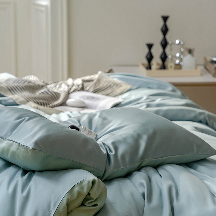 91家纺网 家纺一手货源 找家纺 威克凯丽 2025新款60支纯色兰精天丝四件套--风格一 天空蓝-浅艾绿