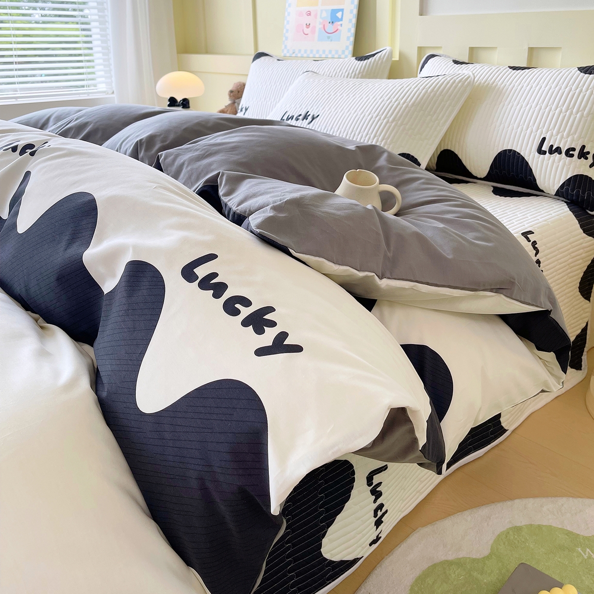 91家纺网 家纺一手货源 找家纺 金鑫汇家纺2025新款A类全棉印花床盖四件套 波浪世界