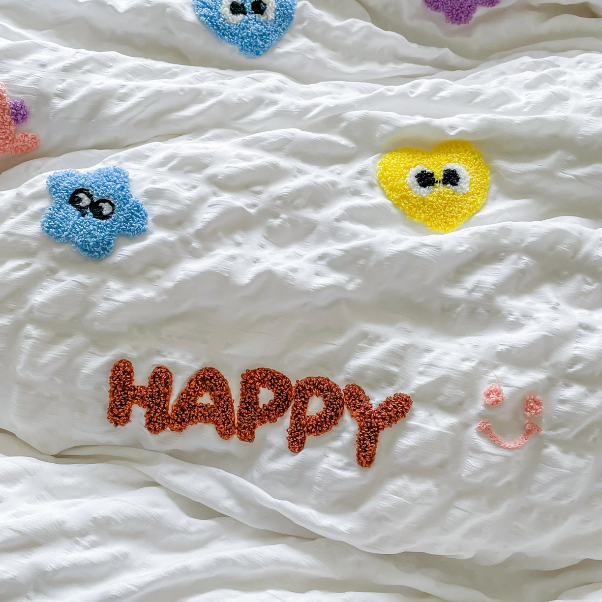 91家纺网 家纺一手货源 找家纺 （总）千希家纺 2025新款高克重超柔泡泡纱毛巾绣泡芙精灵系列四件套