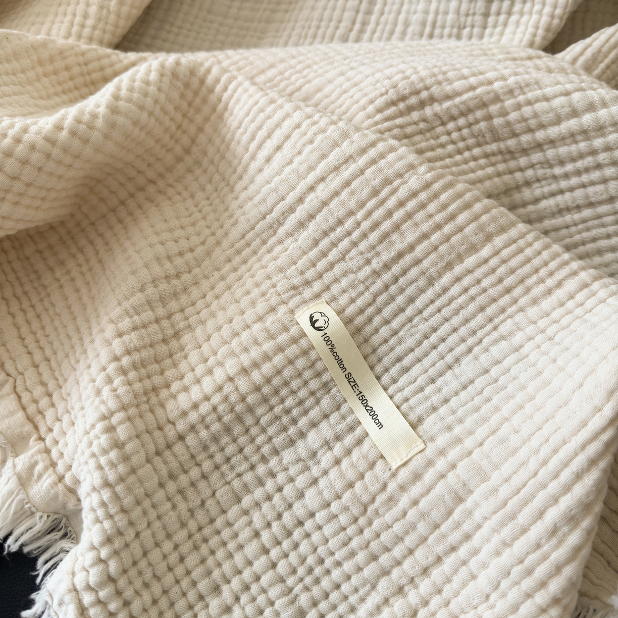 91家纺网 家纺一手货源 找家纺 淑女公社 2025四季新款四层纱皱皱流苏毯 温润奶白