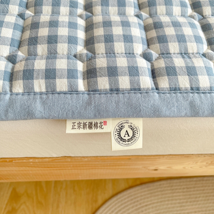 91家纺网 家纺一手货源 找家纺 梵朴 2025新款A类无印风水洗棉夹棉新疆棉花宿舍学生床垫床护垫 蓝小格