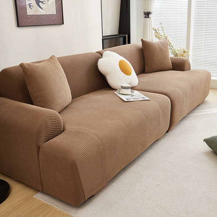 91家纺网 家纺一手货源 找家纺 丝绮鹿  2025新款玉米粒沙发套 驼色