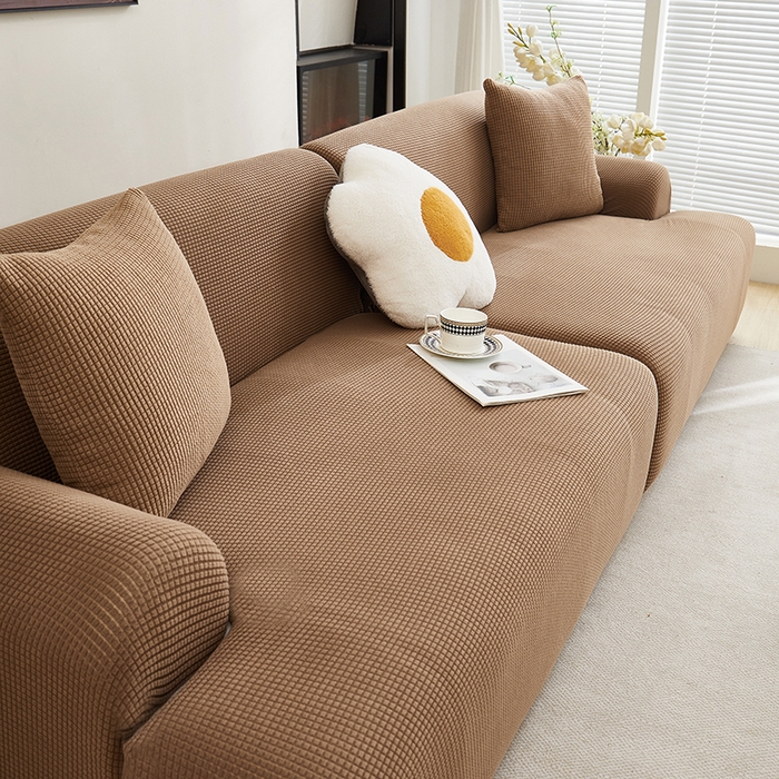 91家纺网 家纺一手货源 找家纺 丝绮鹿  2025新款玉米粒沙发套 驼色
