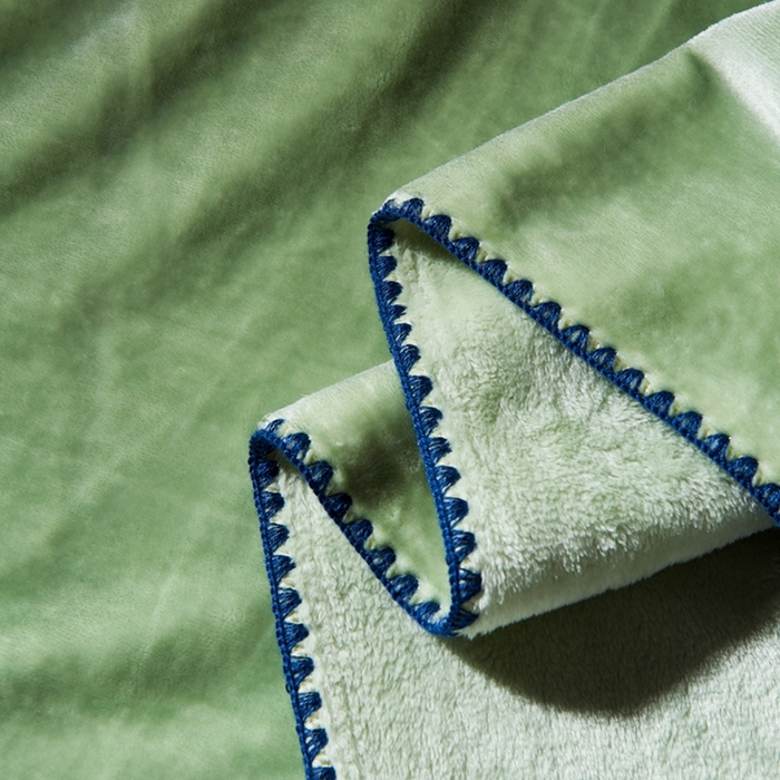 91家纺网 家纺一手货源 找家纺 馨米莱家纺2025新款贝壳边牛奶绒毛毯 欧碧绿