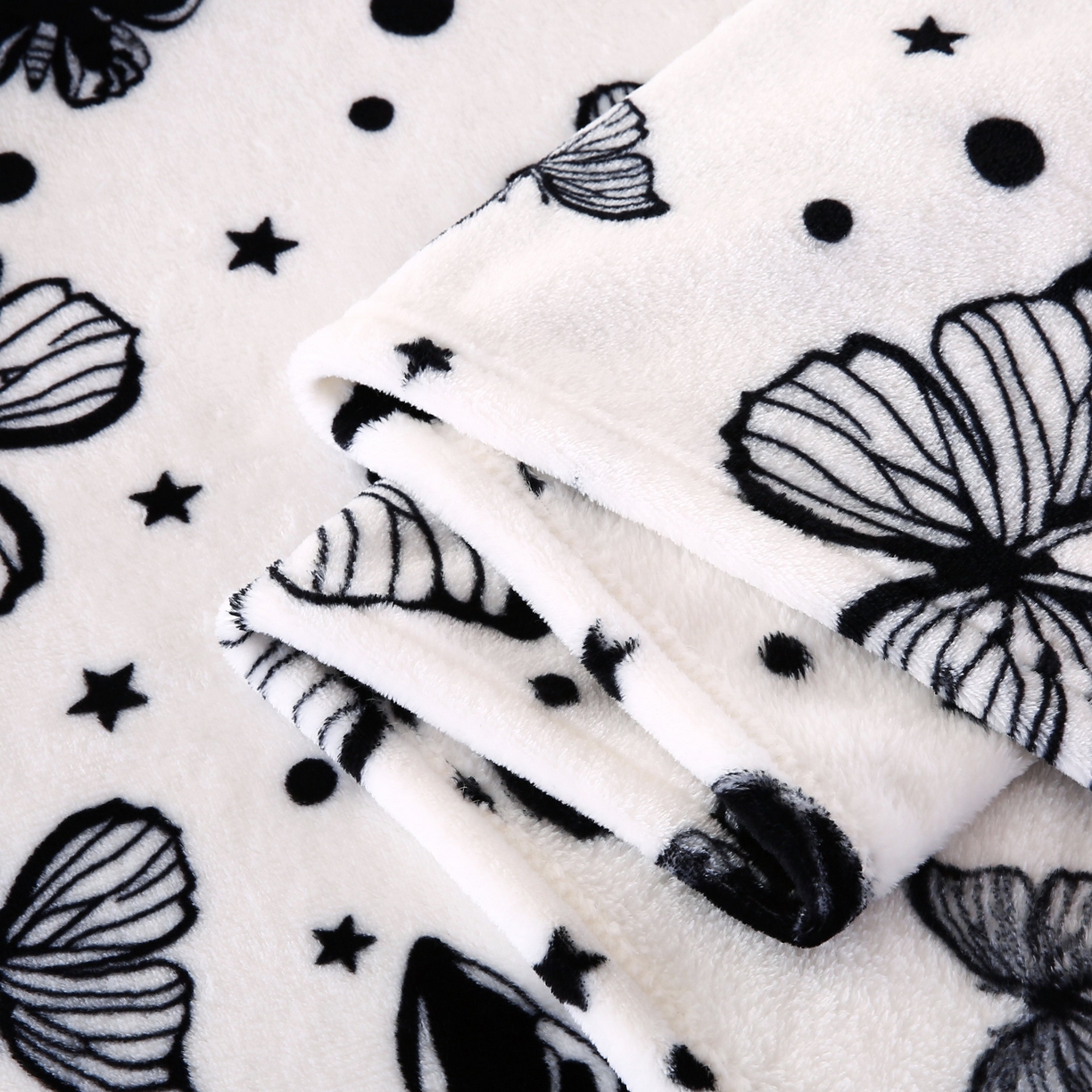 91家纺网 家纺一手货源 找家纺 璐维斯 2025新款直播260g法莱绒毯子牛奶绒印花毛毯沙发巾沙发毯跨境外贸 黑白蝴蝶