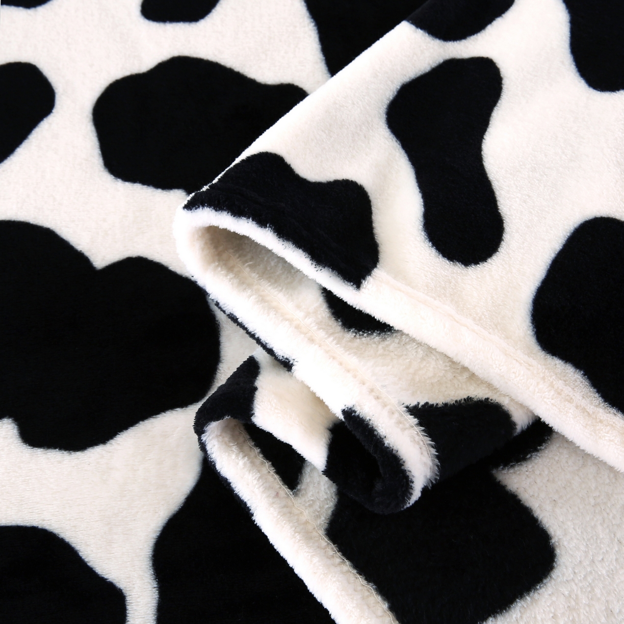 91家纺网 家纺一手货源 找家纺 璐维斯 2025新款直播260g法莱绒毯子牛奶绒印花毛毯沙发巾沙发毯跨境外贸 奶牛纹