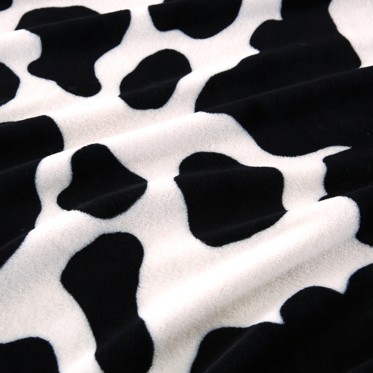 91家纺网 家纺一手货源 找家纺 璐维斯 2025新款直播260g法莱绒毯子牛奶绒印花毛毯沙发巾沙发毯跨境外贸 奶牛纹