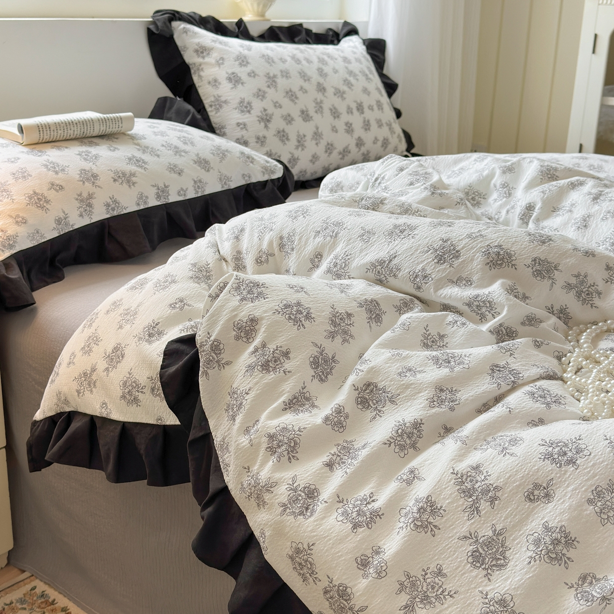 91家纺网 家纺一手货源 找家纺 喜颜 2025新款云感提花皱皱棉爆款花边四件套-赫本风 繁花