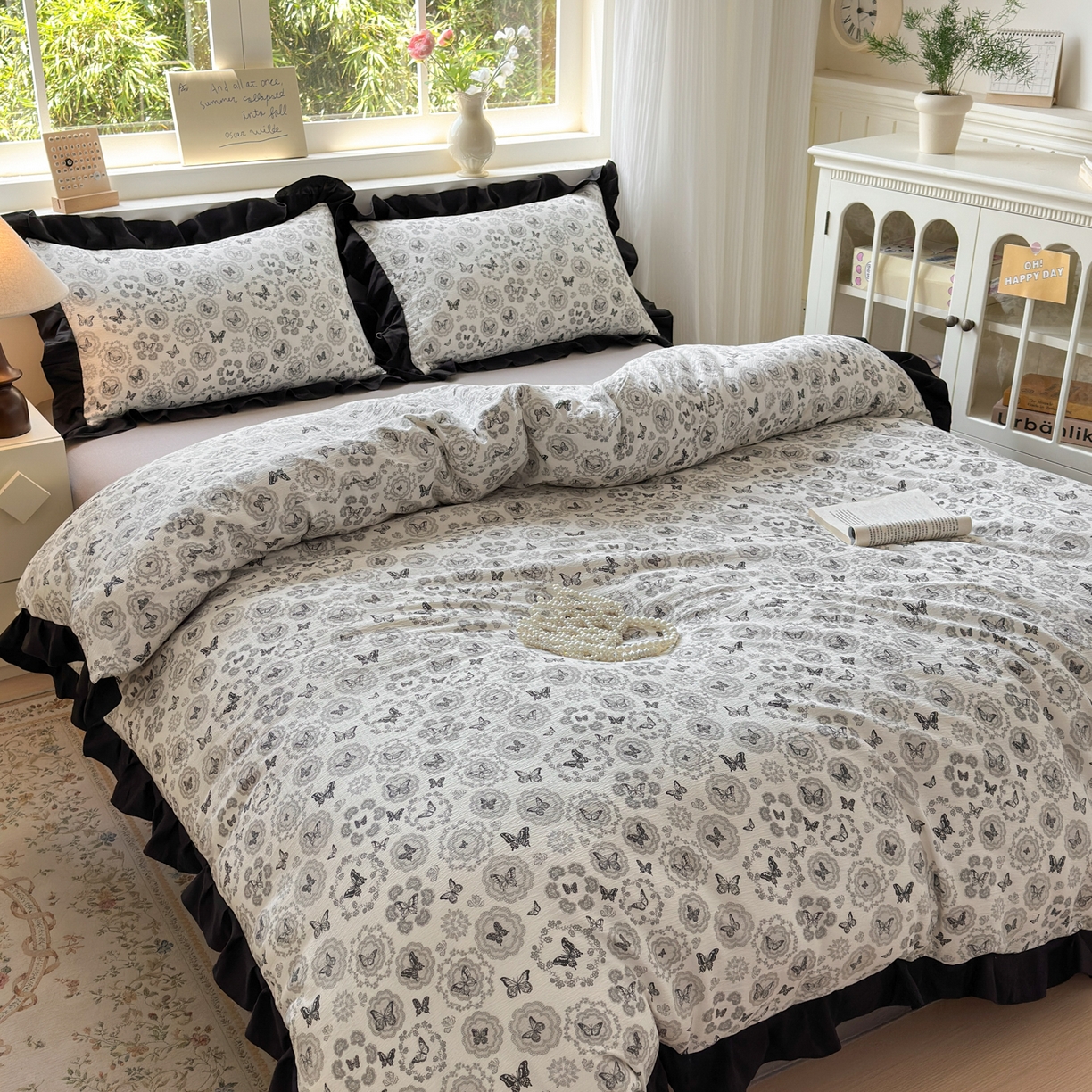 91家纺网 家纺一手货源 找家纺 喜颜 2025新款云感提花皱皱棉爆款花边四件套-赫本风 蝴蝶黑