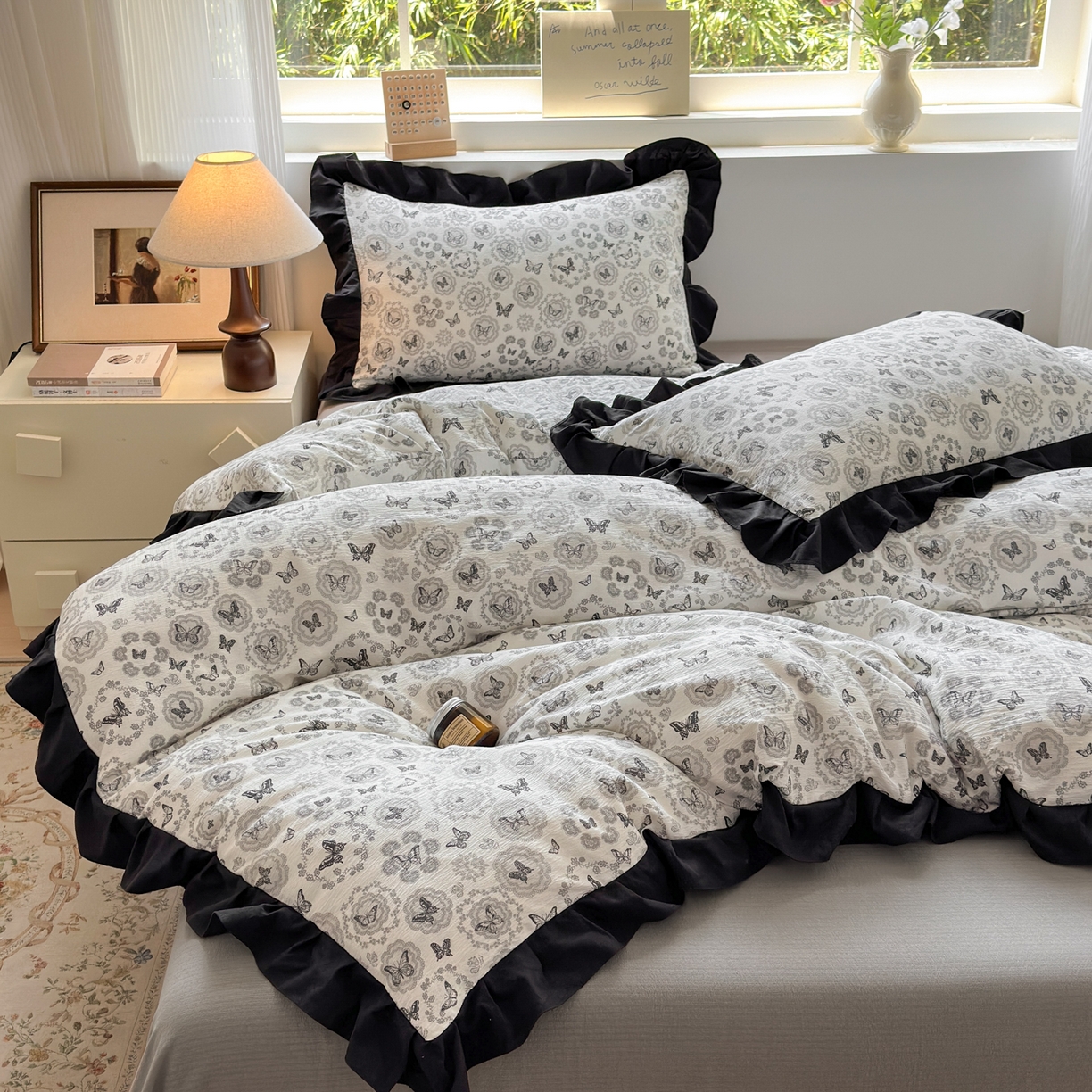 91家纺网 家纺一手货源 找家纺 喜颜 2025新款云感提花皱皱棉爆款花边四件套-赫本风 蝴蝶黑