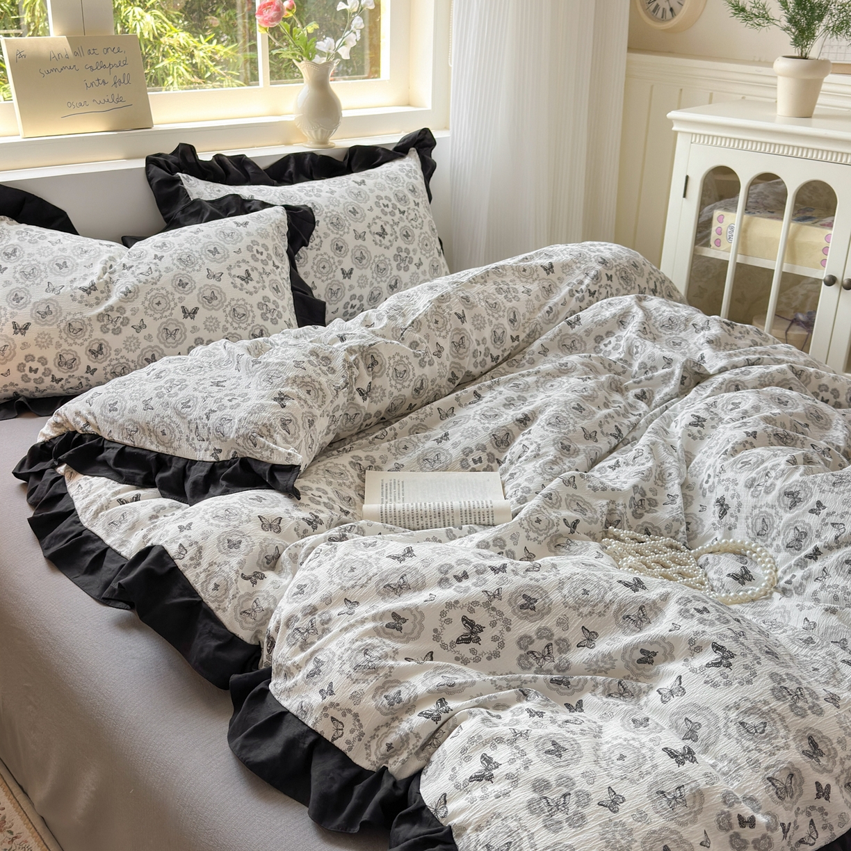 91家纺网 家纺一手货源 找家纺 喜颜 2025新款云感提花皱皱棉爆款花边四件套-赫本风 蝴蝶黑