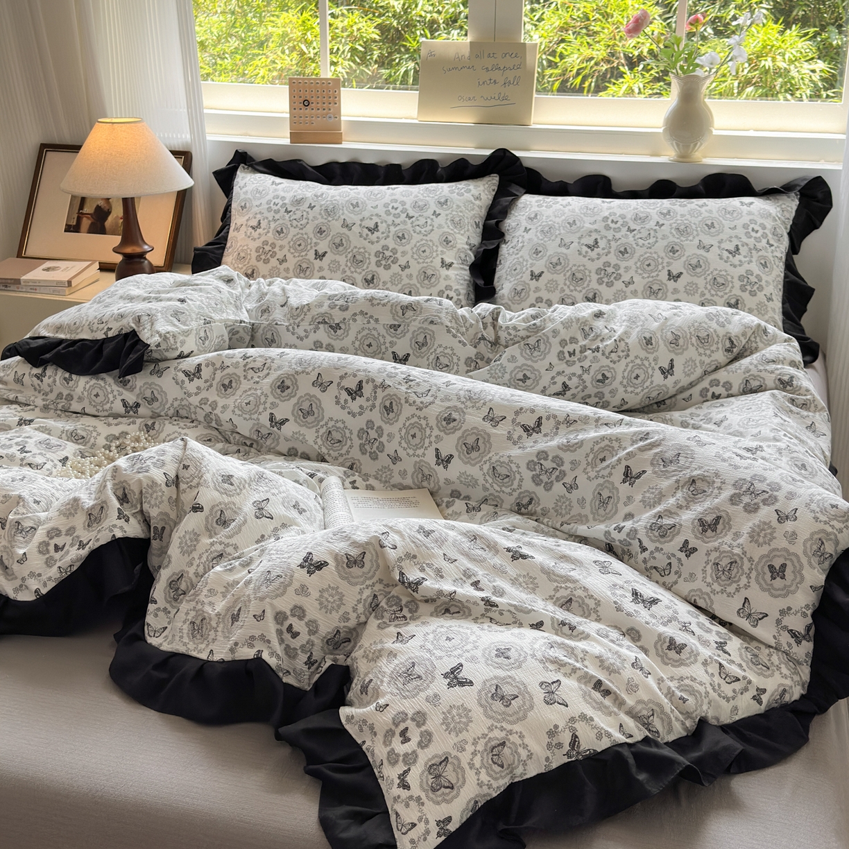 91家纺网 家纺一手货源 找家纺 喜颜 2025新款云感提花皱皱棉爆款花边四件套-赫本风 蝴蝶黑