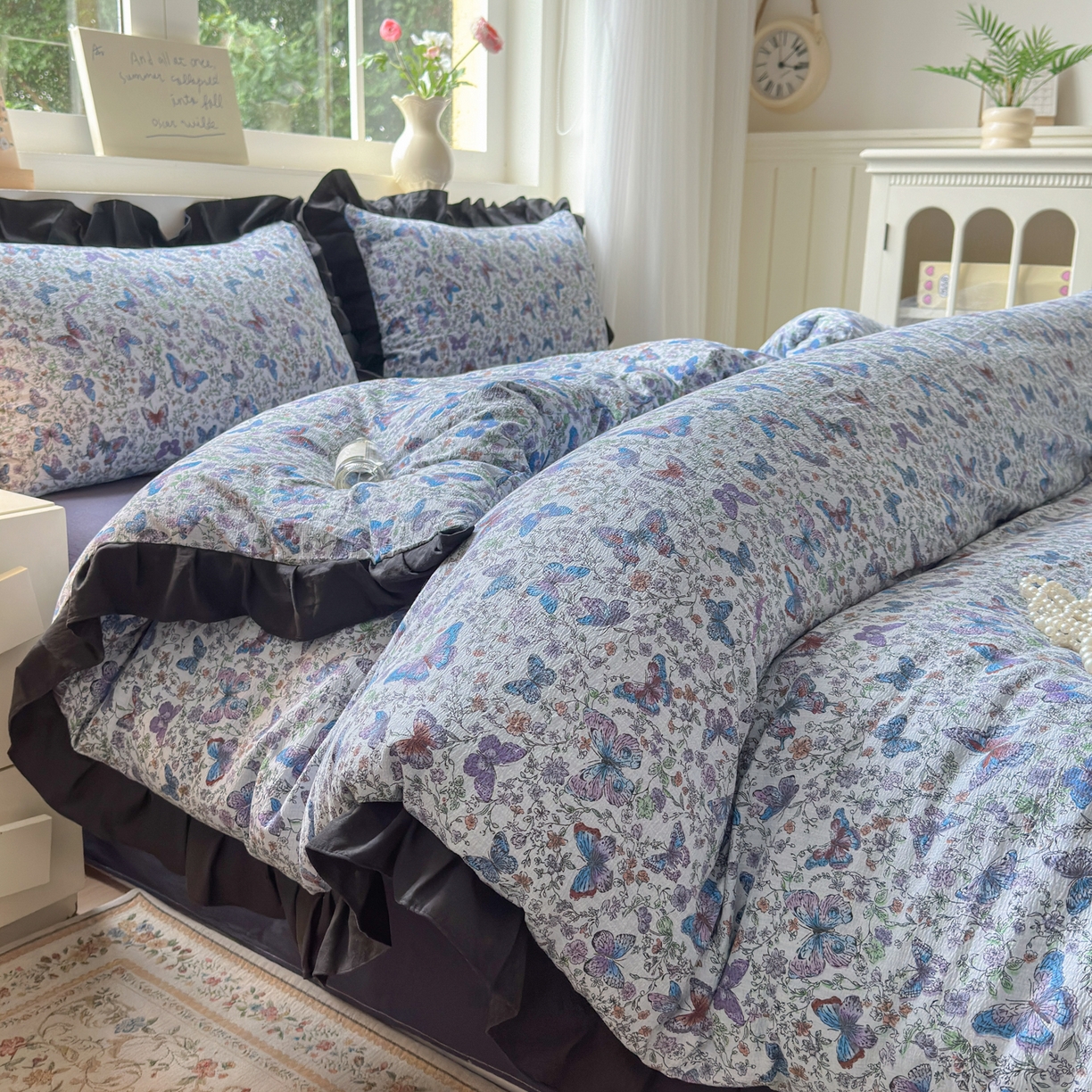 91家纺网 家纺一手货源 找家纺 喜颜 2025新款云感提花皱皱棉爆款花边四件套-赫本风 炫彩蝴蝶